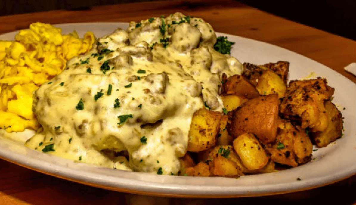 This is an image of biscuits and gravy from From Scratch Restaurant at The Barnyard Shopping Village Carmel