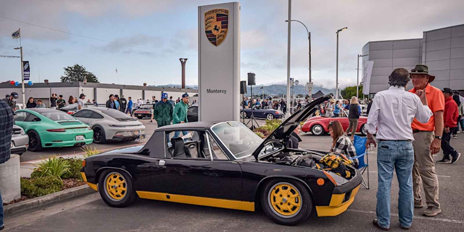 This is an image of a classic car on display at Porsche Monterey Classic during Monterey Car Week